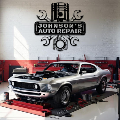 Custom mechanic sign displayed on a workshop wall to show scale and size